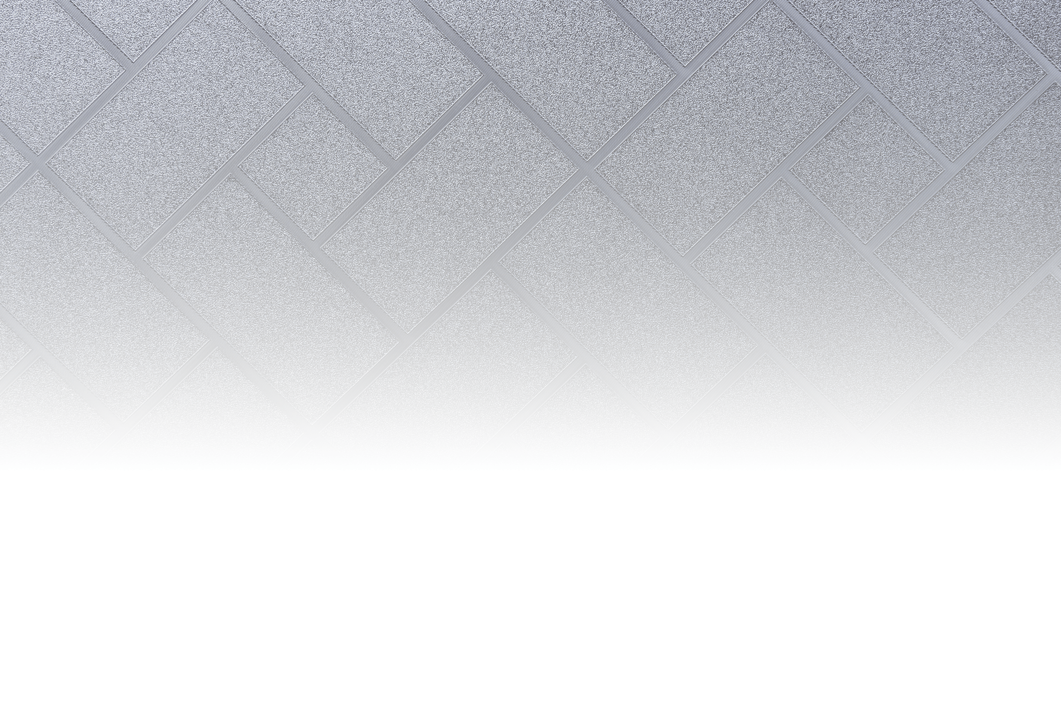 A person walks by the textured wall of the Japan National Stadium in Tokyo on a sunny day, wearing casual clothing.