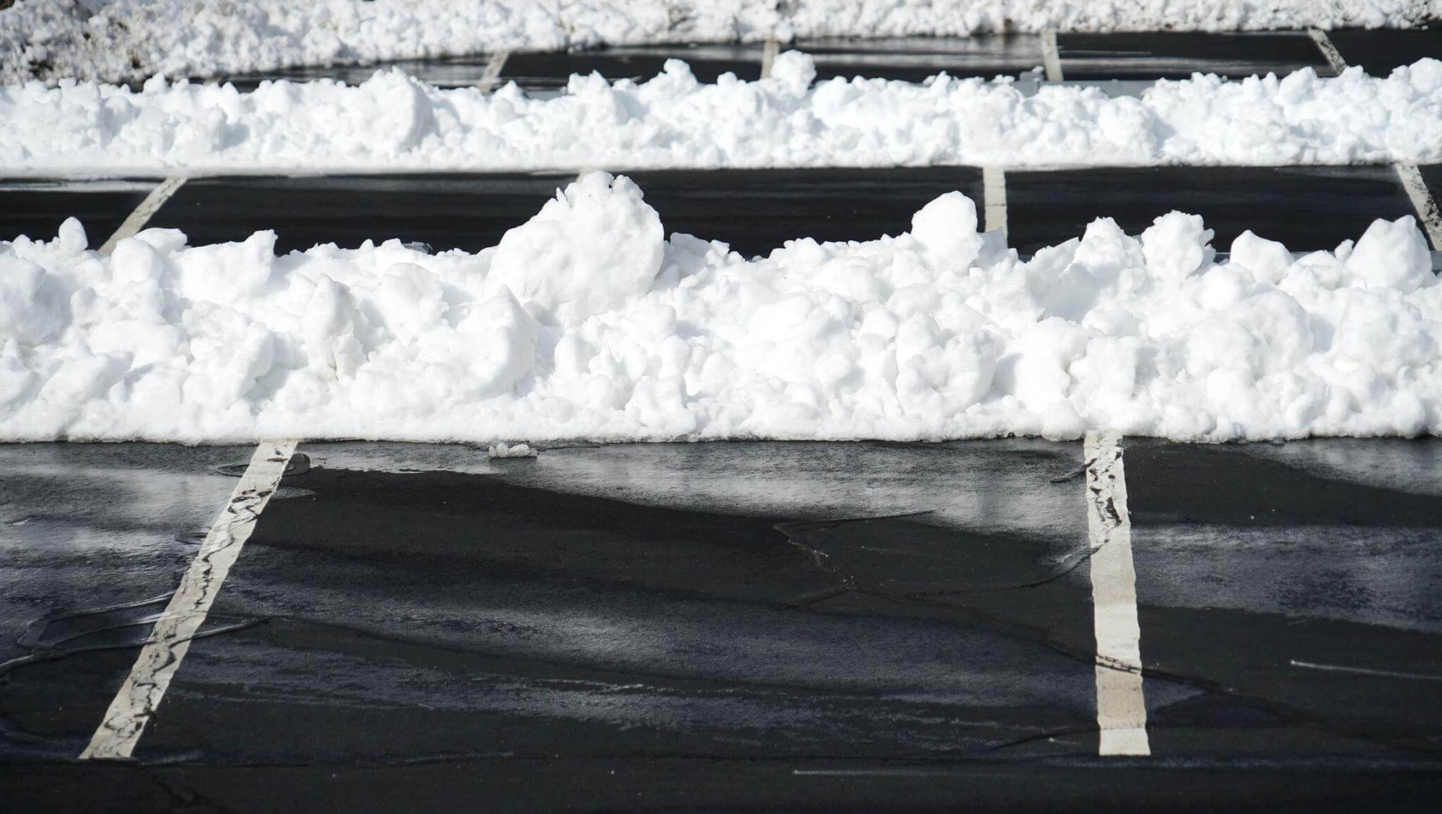 Parking lot covered in snow during winter season