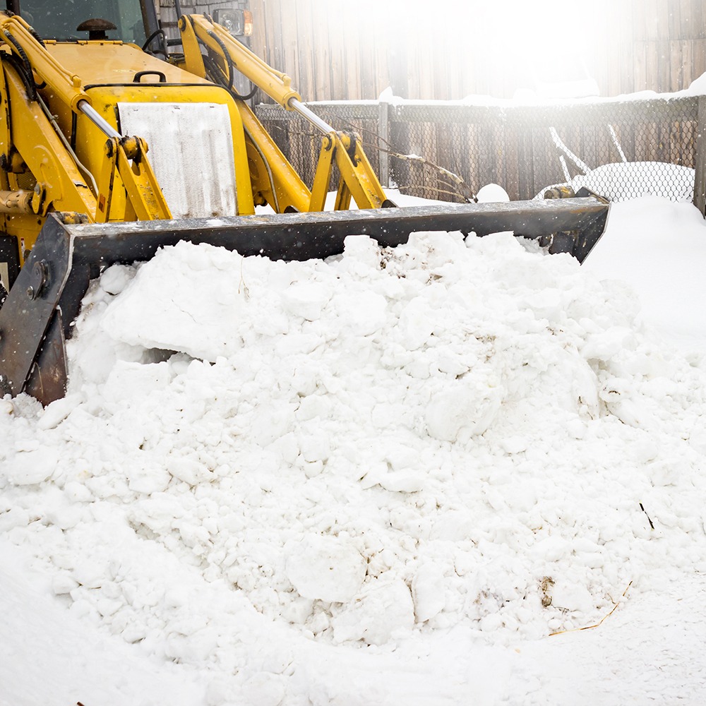 Tractor to clean the snow on the street